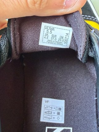 Scarpe Vans con fiamme e scacchi