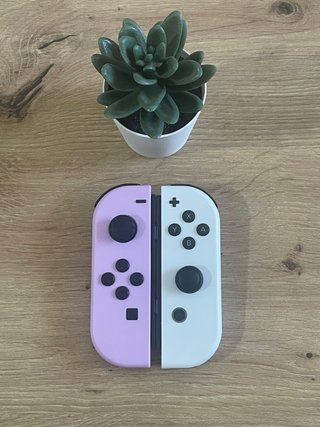 Mandos Nintendo Switch Morado y Blanco