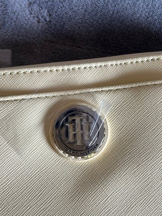 Cartera pulsera Tommy Hilfiger amarilla