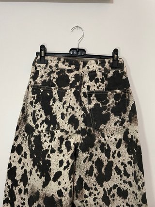 Pantaloni maculati con brillantini