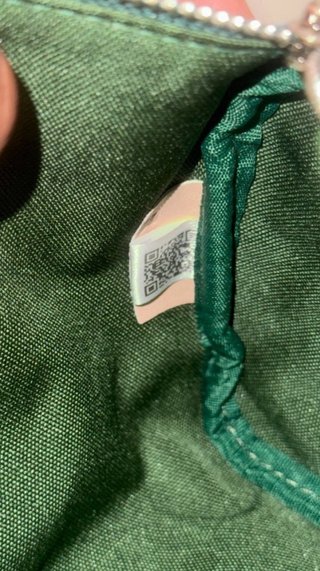 Bandolera Louis Vuitton verde con estampado
