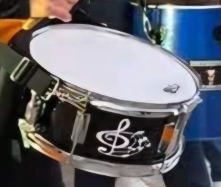 Tambor DB Percussion con baquetas