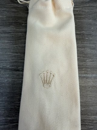 Abanico Rolex de madera y tela