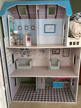 Casita de muñecas de madera