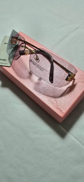 Gafas de sol Miu Miu degradado rosa y gris