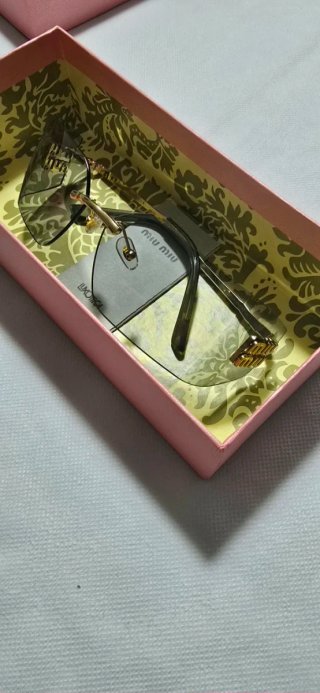 Gafas de sol Miu Miu degradado rosa y gris