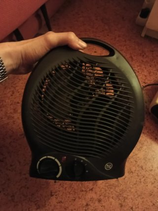 Estufa-ventilador blanco y negro