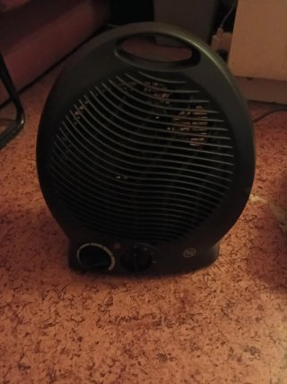Estufa-ventilador blanco y negro