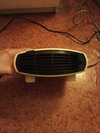 Estufa-ventilador blanco y negro
