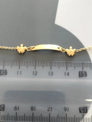 Pulsera bebé oro de ley nueva.