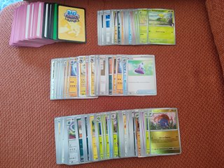 Lote 128Cartas Pokémon TCG + 150 Protectores