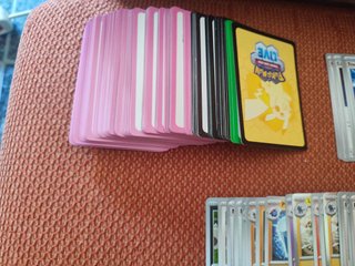 Lote 128Cartas Pokémon TCG + 150 Protectores