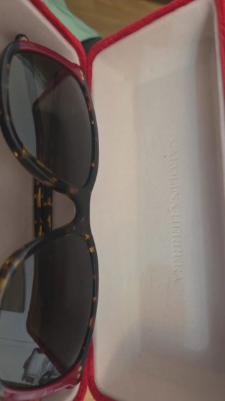 Gafas de sol Carolina Herrera marrones y rojas