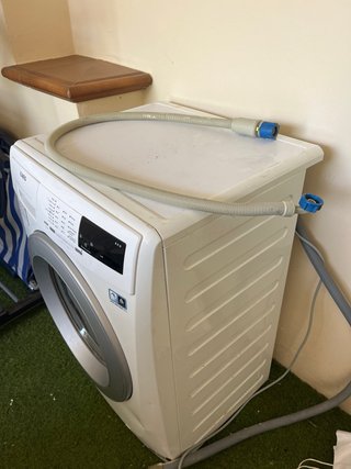 Lavadora AEG para piezas.LEER DESCRIPCION