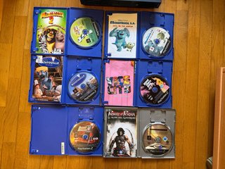 Playstation 2 Negra + 2 Mandos