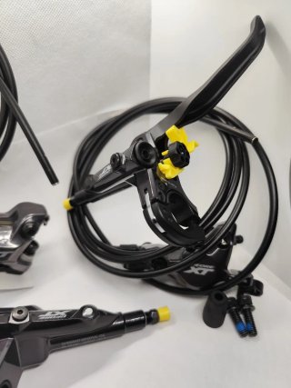 Conjunto frenos Shimano XT Tras-2 Pist+Del-4 Pist