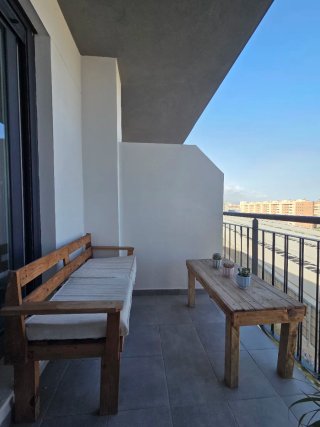 Conjunto sofá y mesa de jardín exterior