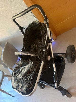 Cochecito de bebé negro estampado