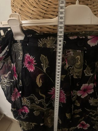 Pantaloni lunghi floreali neri e rosa