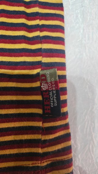 Camiseta Herd rayas roja y amarilla