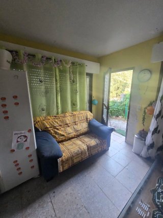 parcela con 2 construcciones