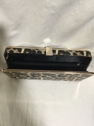 Cartera de mano animal print