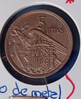 5 Ptas. Franco 1957 Exceso Metal toda la moneda.