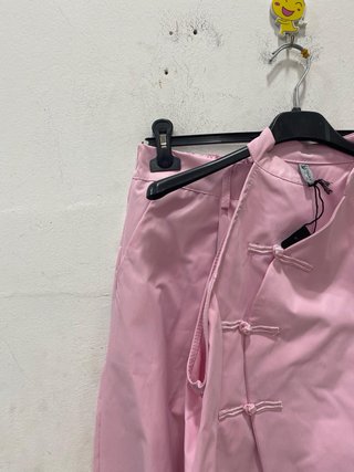 Completo rosa con top e pantaloni