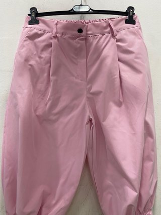 Completo rosa con top e pantaloni