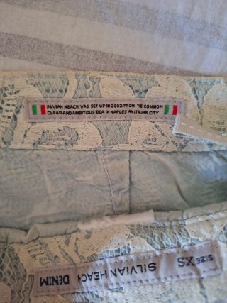 Pantalón corto encaje blanco y azul