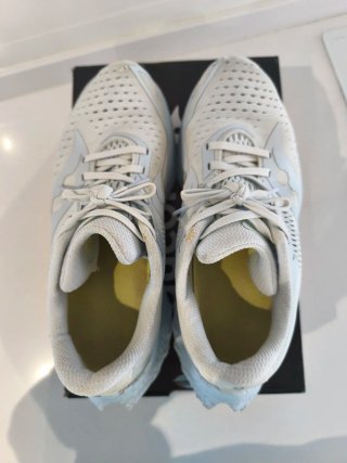Zapatillas Saucony grises y blancas