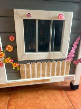 Casita de madera para perro con porche