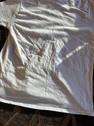 Camiseta Scalpers blanca con calavera