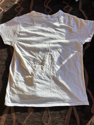 Camiseta Scalpers blanca con calavera