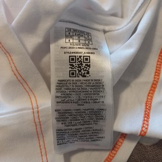 T-shirt GUESS bianca con stampa arancione