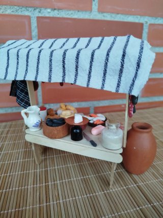 Miniatura Belén puesto de comida