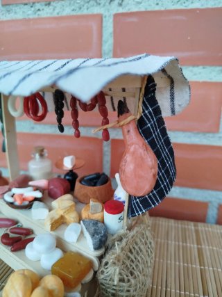 Miniatura Belén puesto de comida