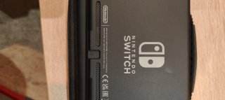 Nintendo Switch Completa Negra y Roja