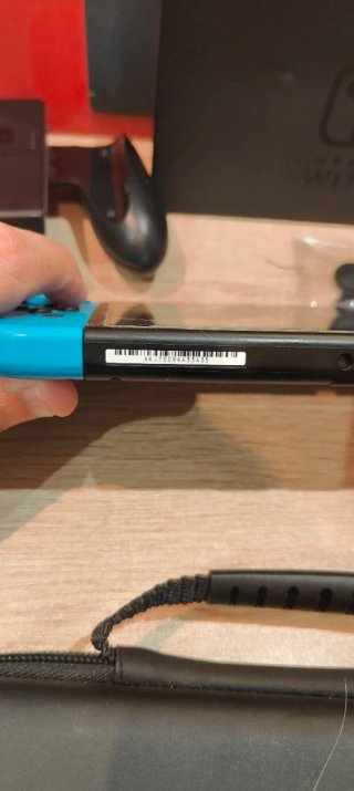 Nintendo Switch Completa Negra y Roja