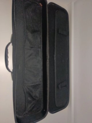 Caña de pescar casting con funda y accesorios
