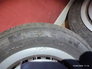 Llantas Mercedes 190 con tapacubos