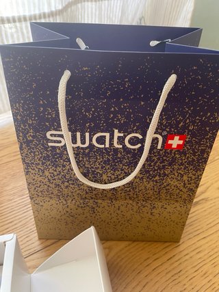 Swatch Omega Mission to the Moonphase Snoopy