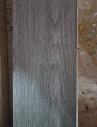 Rivestimento pavimento effetto legno grigio