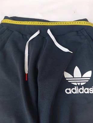 Pantalón Adidas mujer con las rayas rojas Talla M