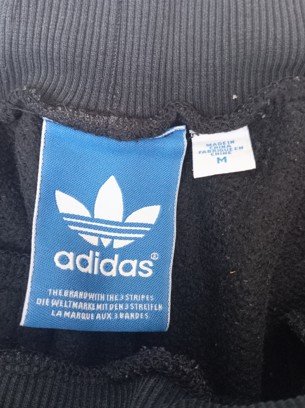Pantalón Adidas mujer con las rayas rojas Talla M