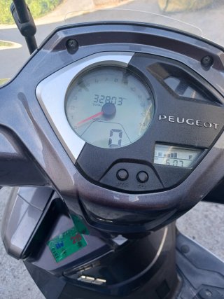 Peugeot Belville gris, maxi-scooter