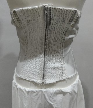 Top corsé denim metalizado. Zara.