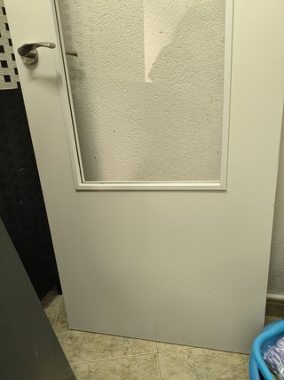 Puerta interior maciza con cristal