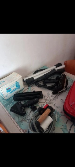 Vaporeta roja con accesorios