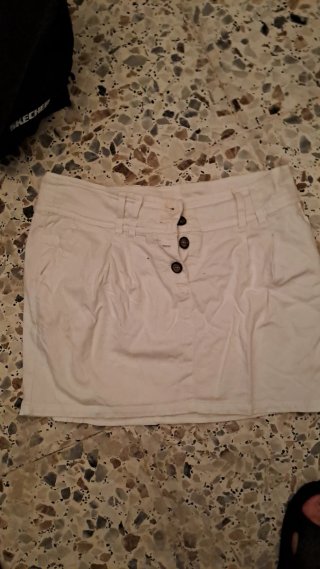 Falda blanca de mujer tengo otra azul igua y otra